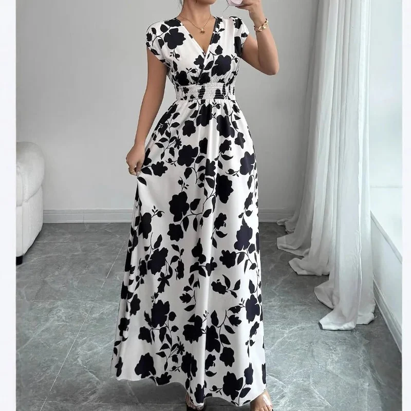 Verleihen Sie Ihrem Sommer-Look mit unserem Damen-Sommerkleid mit V-Ausschnitt das gewisse Etwas.