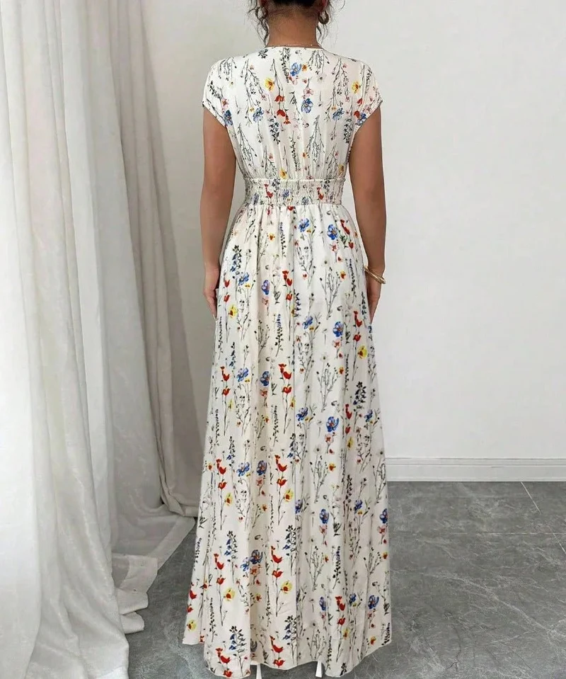 Verleihen Sie Ihrem Sommer-Look mit unserem Damen-Sommerkleid mit V-Ausschnitt das gewisse Etwas.