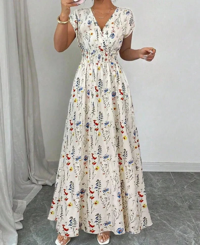 Verleihen Sie Ihrem Sommer-Look mit unserem Damen-Sommerkleid mit V-Ausschnitt das gewisse Etwas.