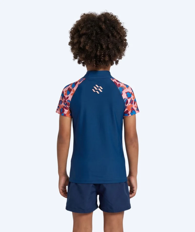 Watery UV Shirt für Kinder - Osiris Kurzarm Rashguard - Hellrosa/Dunkelblau