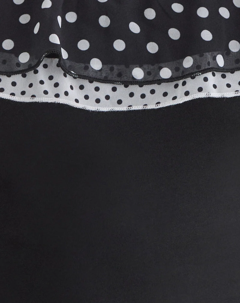 Iridia Top aus Cupro in Schwarz mit kleinen Polka-Rüschen