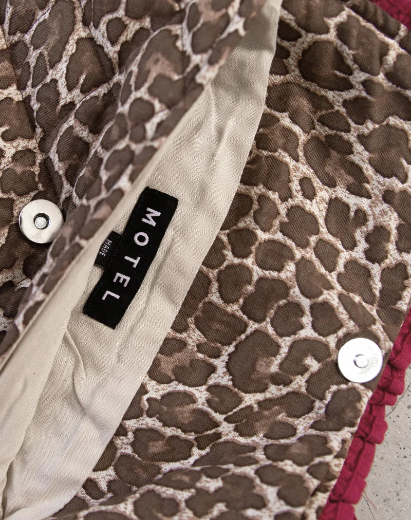 Faltbare Kosmetiktasche in Leopard mit roter Rüschenschleife